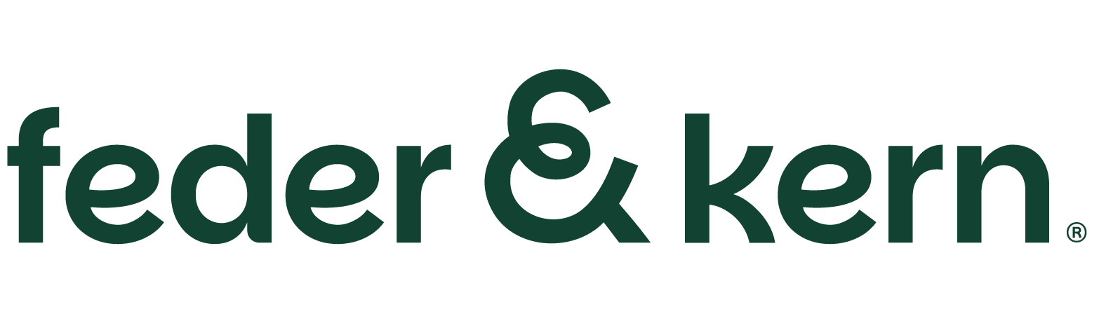 Logo von Feder und kern in grün auf transparentem Hintergrund
